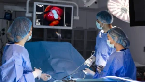 Surgeons performing laparoscopic myomectomy surgery in Birmingham hospital